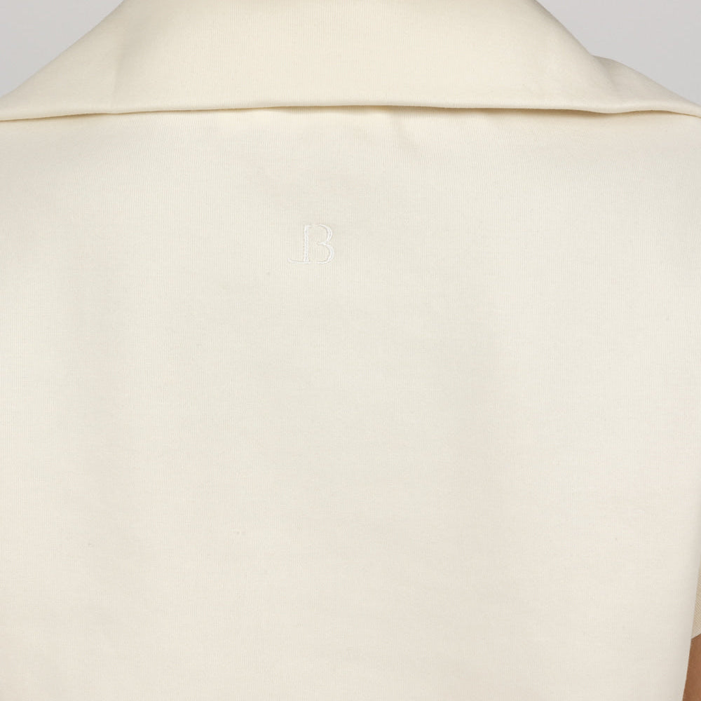 
                      
                        ALIX top in beige back look close up
                      
                    