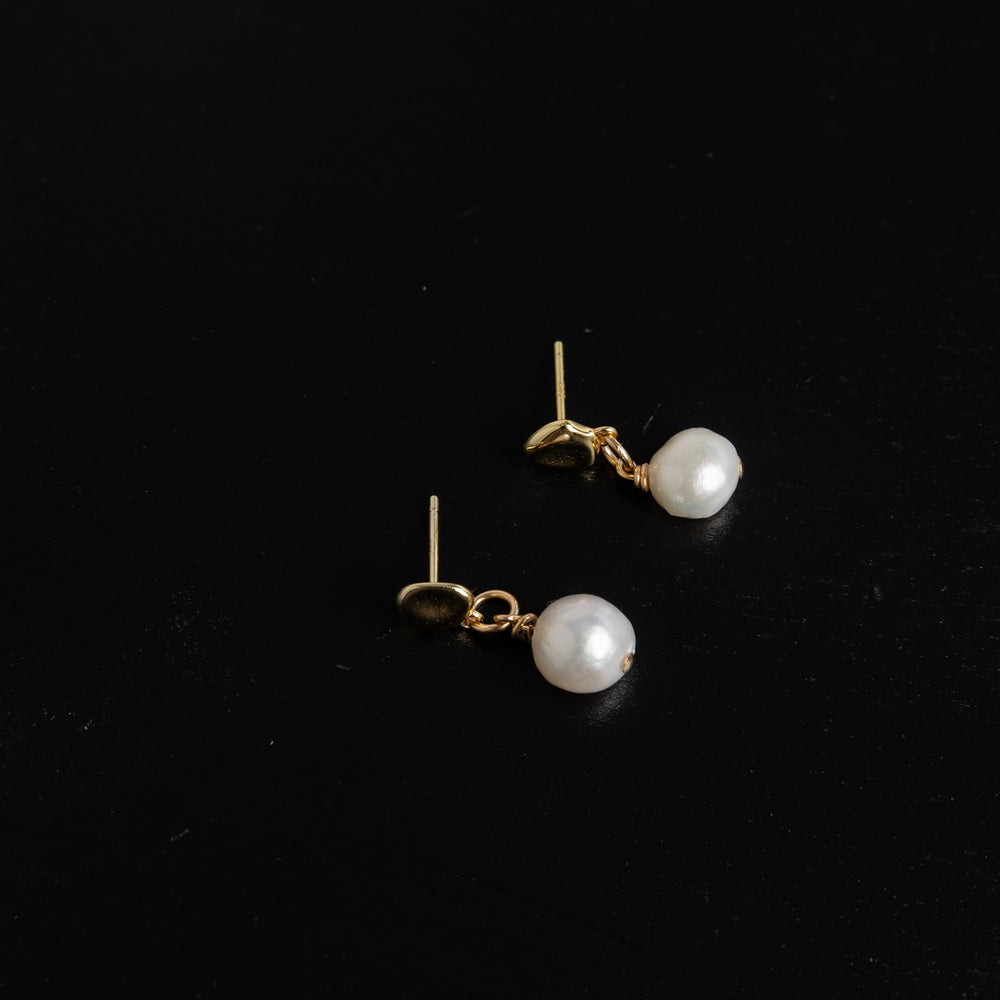 White pearl stud earrings