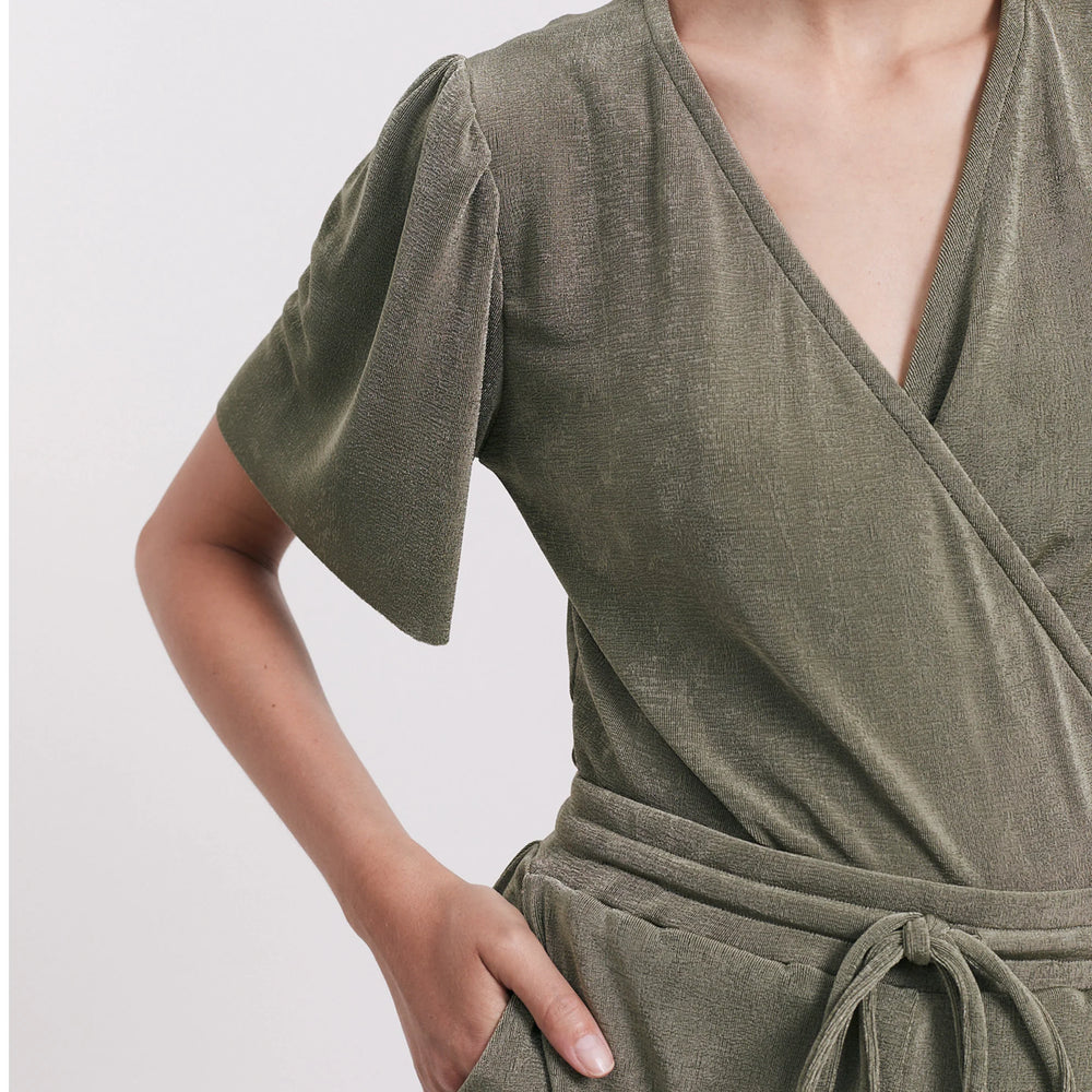 
                      
                        The wrap bodysuit | Olive
                      
                    