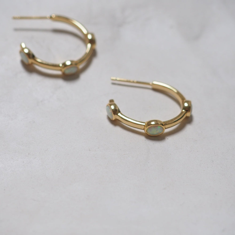 
                      
                        Opal hoops earrings
                      
                    