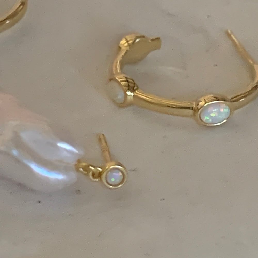 
                      
                        Opal hoops earrings
                      
                    