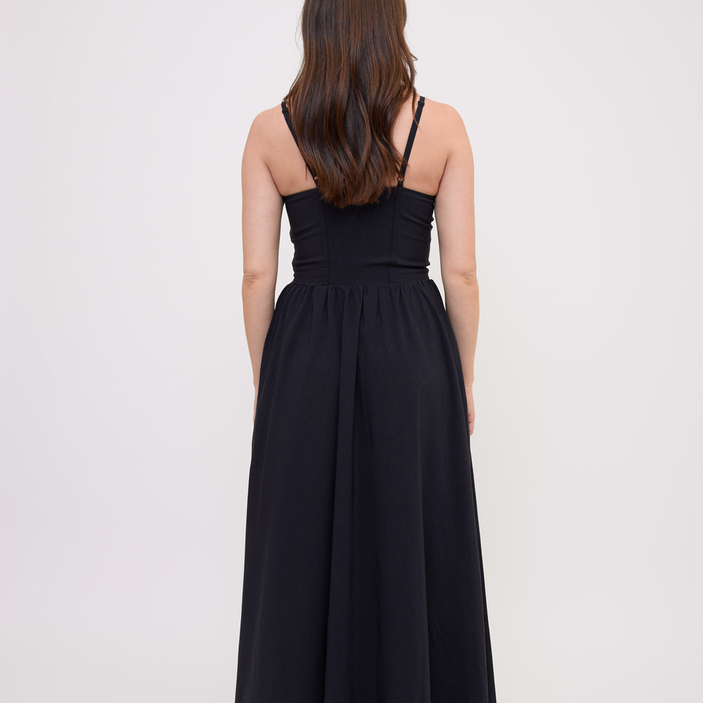 
                      
                        SELENA dress black total back look
                      
                    