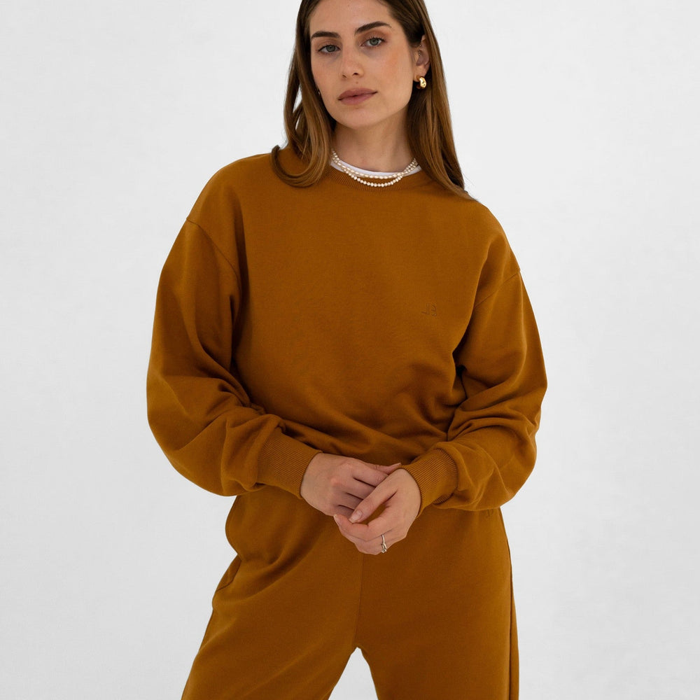 
                      
                        camel tracksuit, full body picture
                      
                    