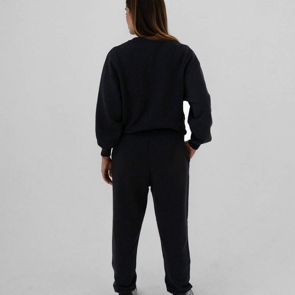 
                      
                        Black tracksuit, full body back picture
                      
                    