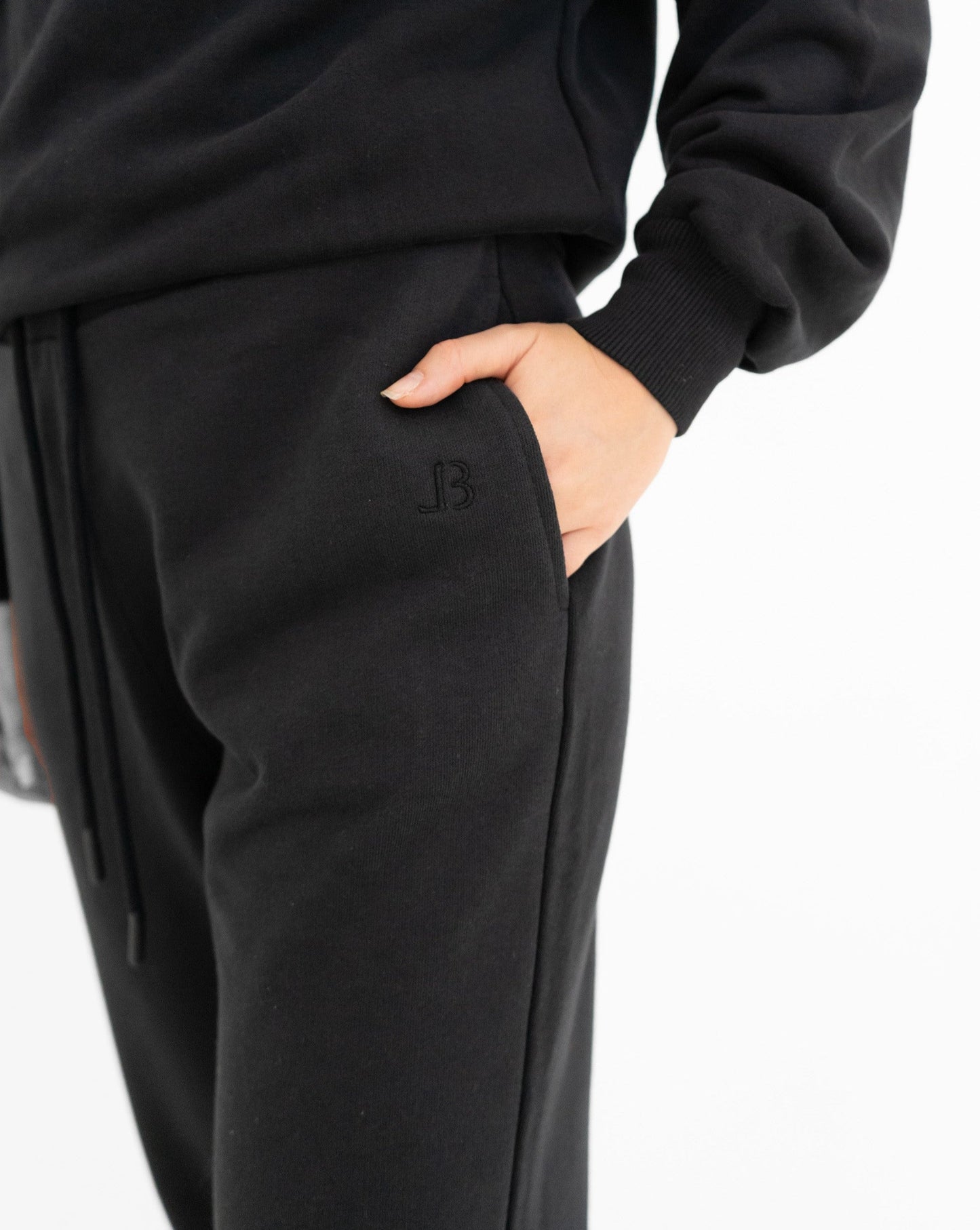 Black tracksuit, close up picture