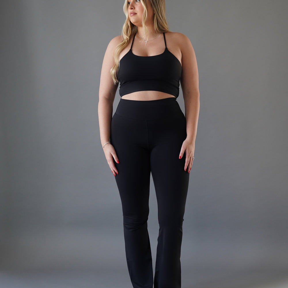 
                      
                        Black flared leggings
                      
                    